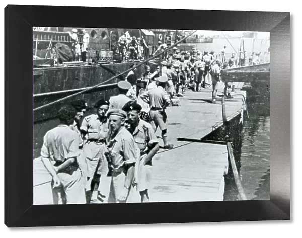 6th battalion embarking at tripoli for invasion of italy