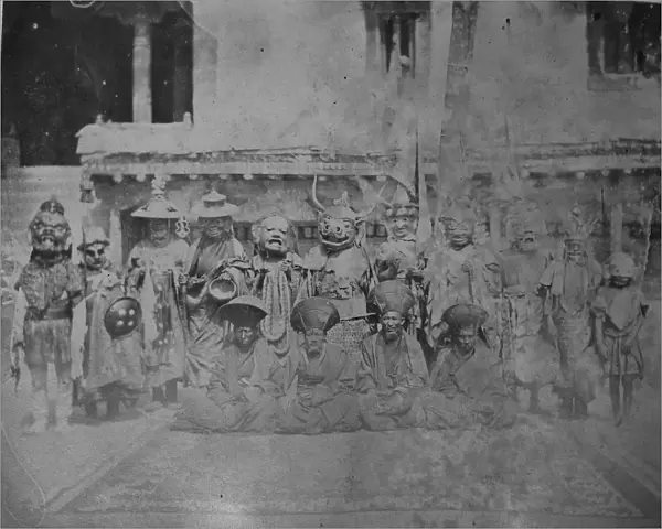Coulson 13 Tibetan lamas geeting ready for religious festival 1868