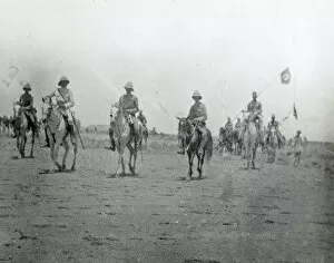 1890s Sudan Collection: the sirdar leaving the battlefield with his own flag and the khalifa black banner
